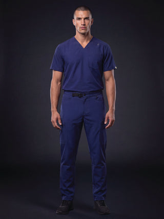 Kyur men's navy blue V-neck scrub top and pants, full front view