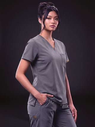 Kyur women's slate gray V-neck scrub top and cargo pants, full front view