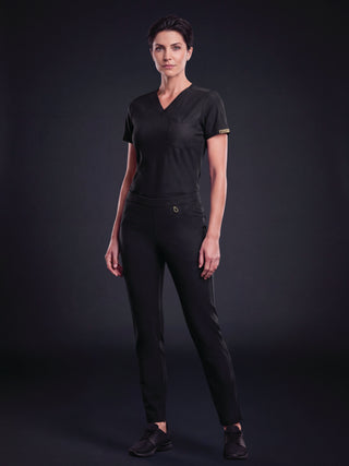 Kyur women's black V-neck scrub top and pants, full front view